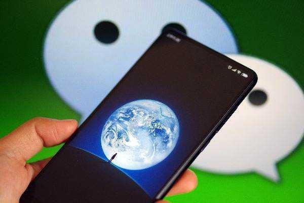 iphone微信朋友圈怎么弄一个虚假的位置_？